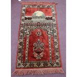 Small red Eastern rug - Approx 114cm x 63cm