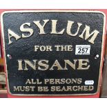Reproduction cast Asylum for the Insane sign
