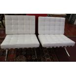 Pair of white Barcelona chairs