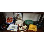 Shelf of advertising ashtrays & advertising mirror