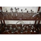 2 shelves of candelabra