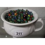 Bedpan of marbles