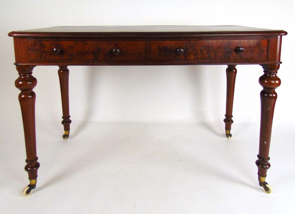 A 19th century mahogany writing table, t