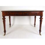 A 19th century mahogany writing table, t