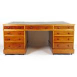 A 19th century mahogany partners desk, t