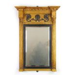 A Regency giltwood mirror, the cornice w