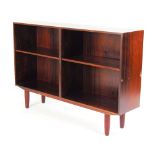 A 1960's rosewood bookcase, with two ope