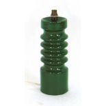 A green ceramic table lamp base of undul