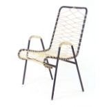 A 1950/60's black tubular lounge chair w