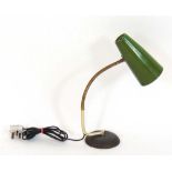 A 1950's green enamelled desk lamp with