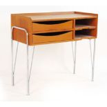 A 1960's teak side table, the galleried