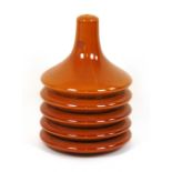 A 1970's mustard pottery lamp base of un