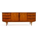 A Younger & Son teak sideboard with a pa