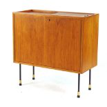 A 1960's teak cabinet with two doors to