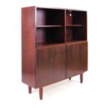 A 1960's Danish rosewood cabinet, the tw