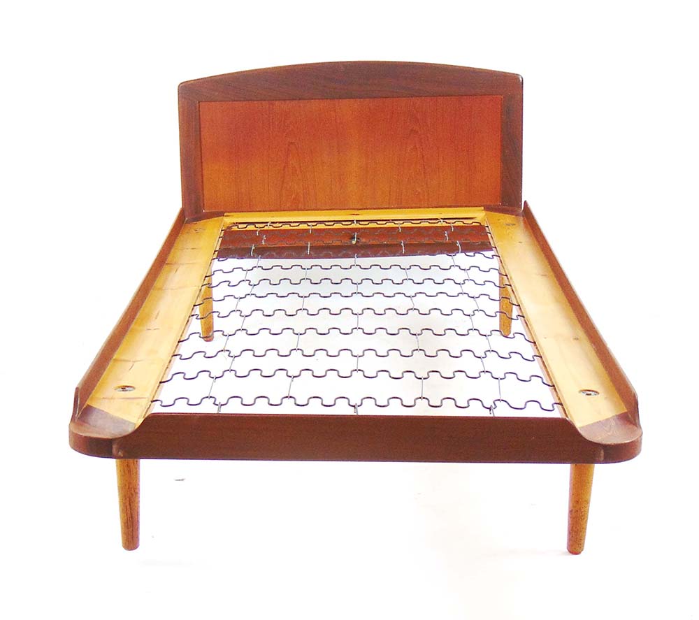 A Danish teak single bedstead