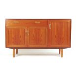 A G-Plan teak sideboard with an arrangem