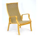 A 1970's beech bentwood armchair with a