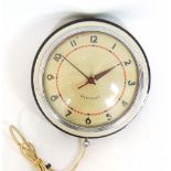 A Westclox circular electric wall clock,