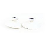 Two white enamelled flush ceiling lights