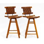 A pair of 1960's elm stools, the thick w