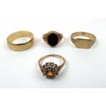 A group of 9ct gold rings to include a w