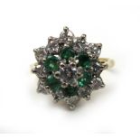 An 18ct gold, diamond and emerald cluste