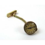 A yellow metal Bucherer brooch watch mar