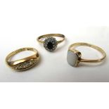 A group of three rings to include an 18c