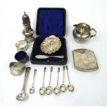 An assortment of silver items to include