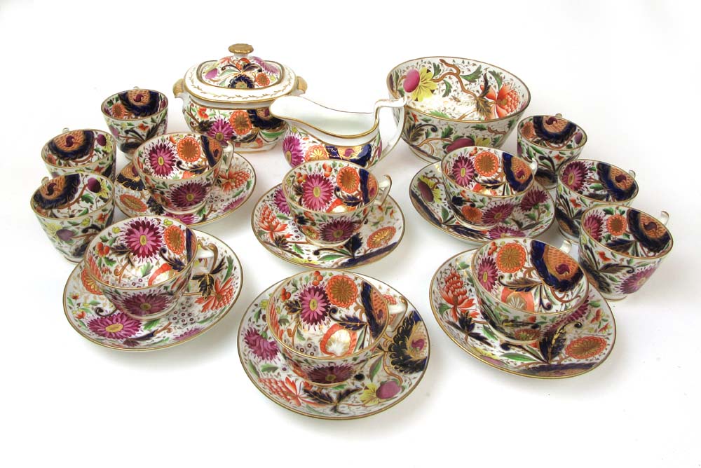 A 19th century Derby style part tea set