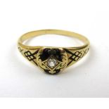 A Victorian yellow metal, black enamel a