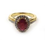 An 18ct gold, ruby and diamond cluster r