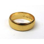 A 22ct gold wedding band. Approx weight