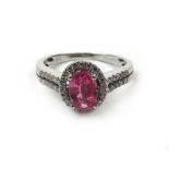 An 18ct white gold, pink sapphire and di