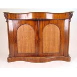 A Victorian rosewood serpentine front ch