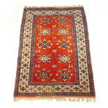 A handwoven Turkish rug, the triple line