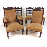 A suite of Edwardian walnut salon chairs