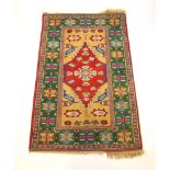 A handwoven Turkish rug, the triple line