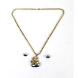 A 9ct gold and blue stone pendant in the