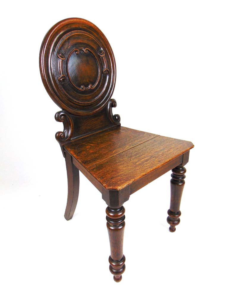 A 19th century oak hall chair, the circu - Image 2 of 2