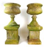 A near pair of modern marble garden urns