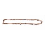 A 9ct rose gold trombone link chain. App