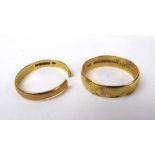 Two 22ct gold wedding bands. Approx weig