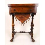 A Victorian rosewood sewing/games table,