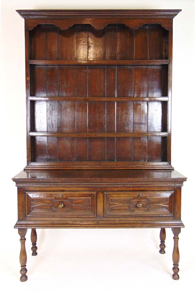 A reproduction oak 17th century style dr