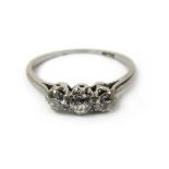 A white metal and diamond trilogy ring m