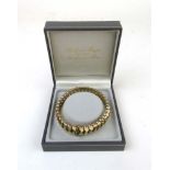 A 9ct gold 'S' link bracelet. Approx wei