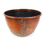 A 19th century copper log bin with rivet