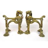 A pair of 19th century brass fire dogs m